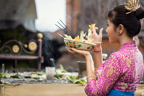 Balinese woman during praying