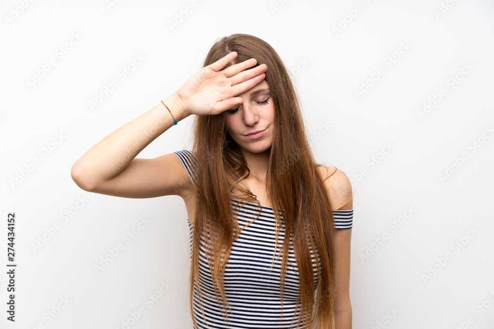 Young woman with long hair over isolated white wall with tired and sick expression Young woman with long hair over isolated white wall with tired and sick expression