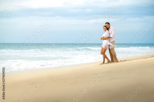 Tender couple on beach