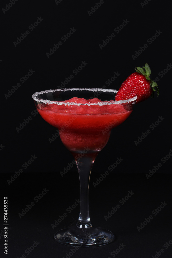 cold strawberry smoothie with ripe strawberries on a black background cold strawberry smoothie with ripe strawberries on a black background