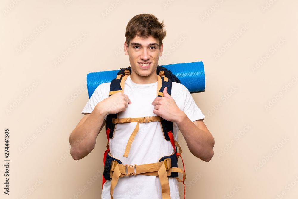 Hiker man over isolated background with surprise facial expression