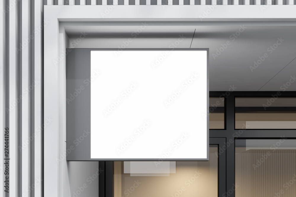 Square mock up sign on white building wall Square mock up sign on white building wall