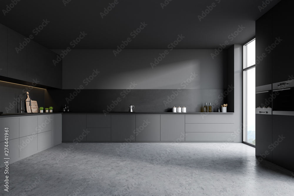 Fototapeta premium Dark ray kitchen, wooden cupboard and counters