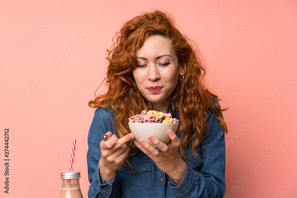 Redhead woman having breakfast Redhead woman having breakfast