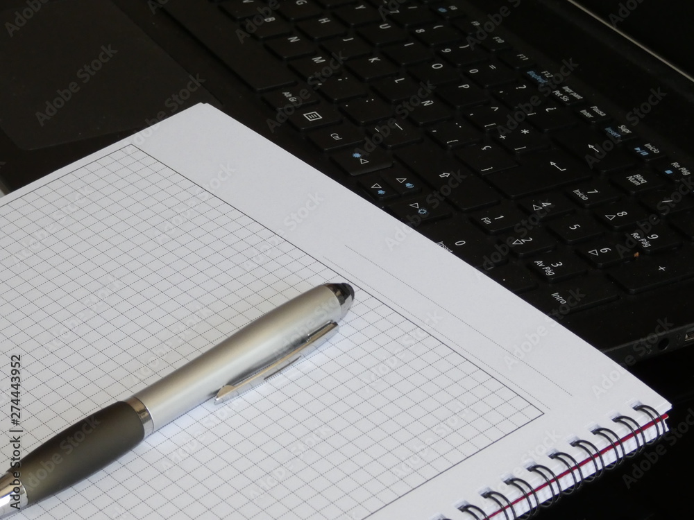 notebook and pen on task notebook and pen on task