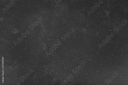 Dust and scratches design. Black abstract background. Vintage decorative overlay. Copy space.