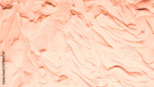 Peach foam texture abstract art background. Smeared whipped cream design surface.
