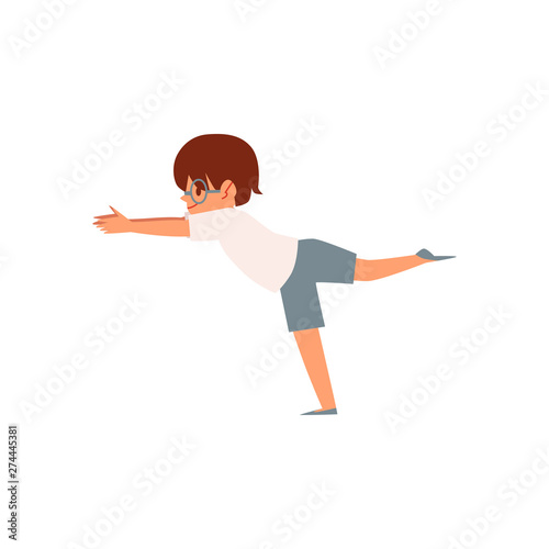 Little boy doing yoga exercise, cute cartoon child character in warrior pose training balance