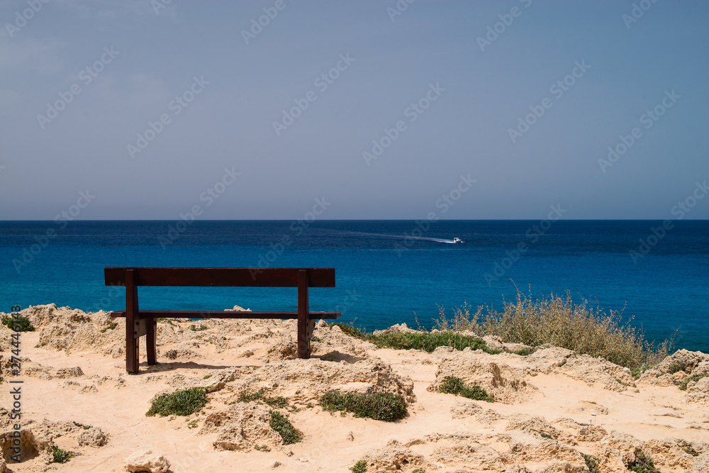 Wooden bench beautiful view on the sea. Green environment landscape Wooden bench beautiful view on the sea. Green environment landscape