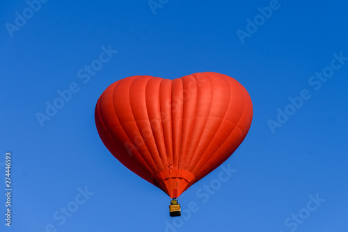 balloon heart on blue sky background symbol of love and romance