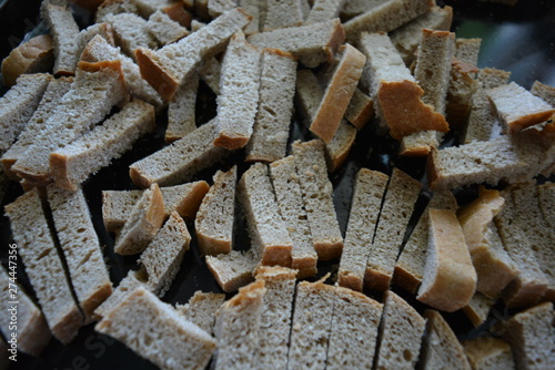 Smooth  sliced       pieces of gray bread for making spicy fried crackers. Natural nutrition  healthy foods for good health.