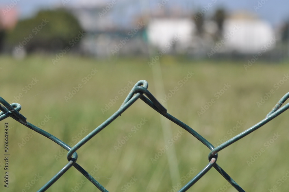 detail of green iron fence detail of green iron fence