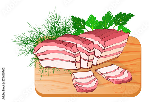 lard with layers of meat on the kitchen board with greens
