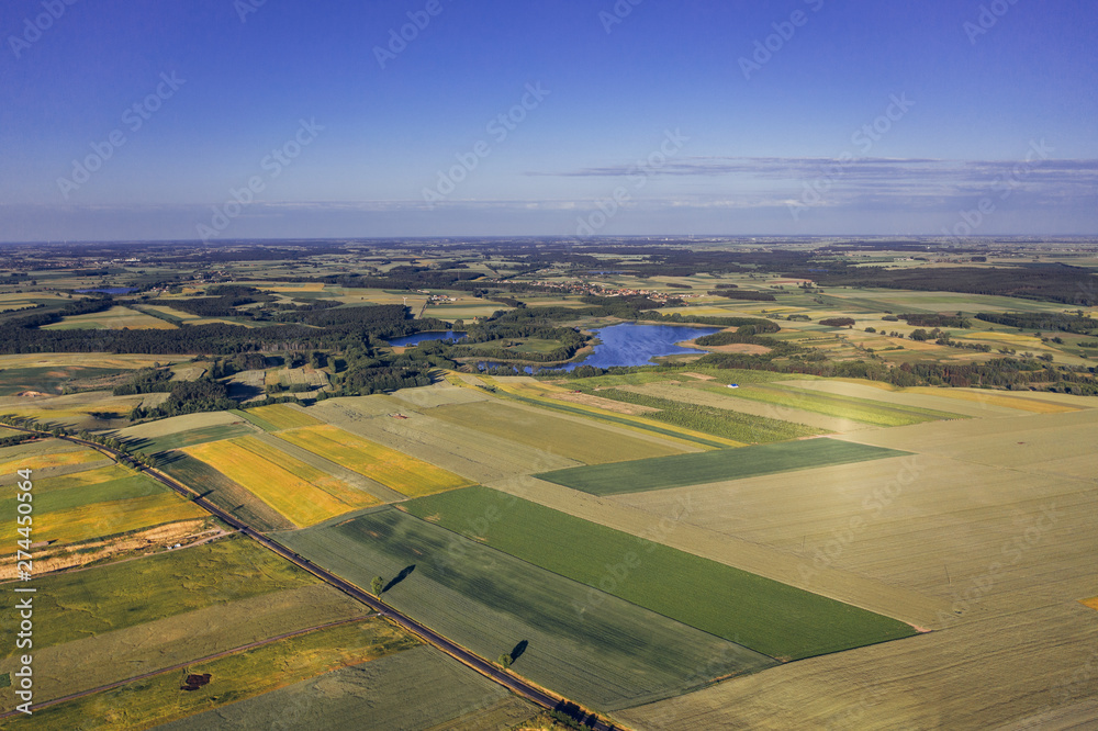 Agricultural field, aerial photography with lake. 
