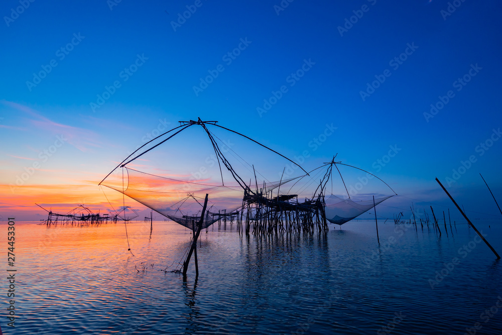Sunrise at Thale Noi Lake Traditional Local Fishing Trap also Known as Yor Building at Pakpra Phatthalung Thailand