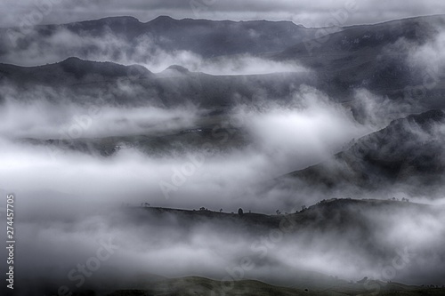View of the foggy valley in Sierra Nevada de Santa Marta, Cordillera, Colombia dramatic scene, beautiful world,scenic view with cloudy sky, majestic impressive dawn in mountain landscape, wallpaper