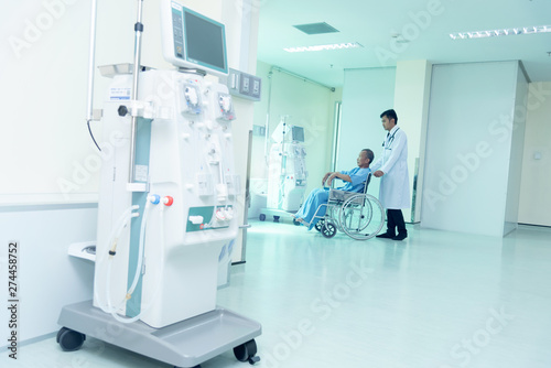 Doctors and sick people With advanced dialysis equipment in the hospital background for business