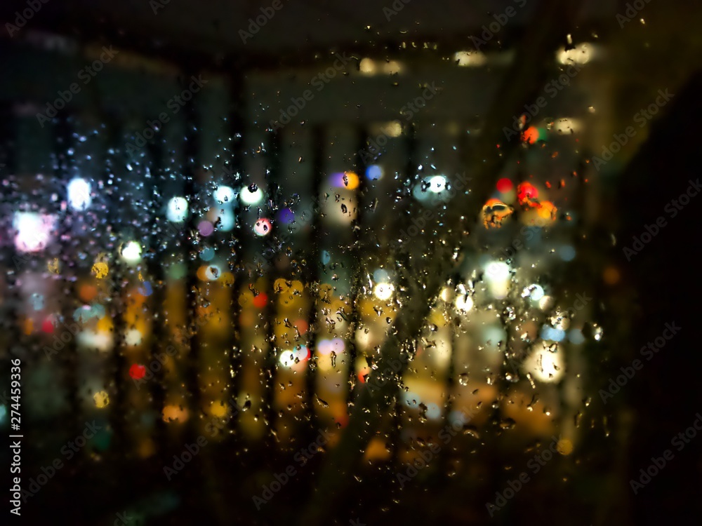 night bokeh blur with rain drop at the corridor
