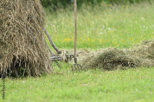 Fotografie Fork and rake tradition hay stack in the village
