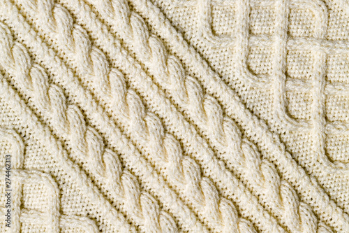 Abstract textured background of close up detail of knitting in a handmade sweater
