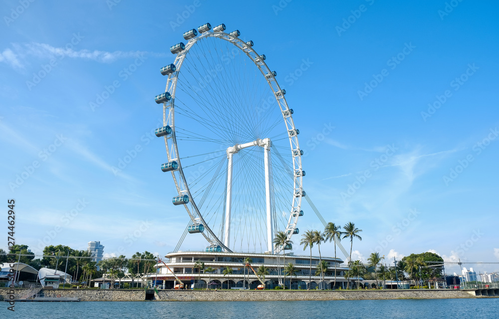Singapore flyer, ferris wheel in sunny day, Singapore tourist attraction