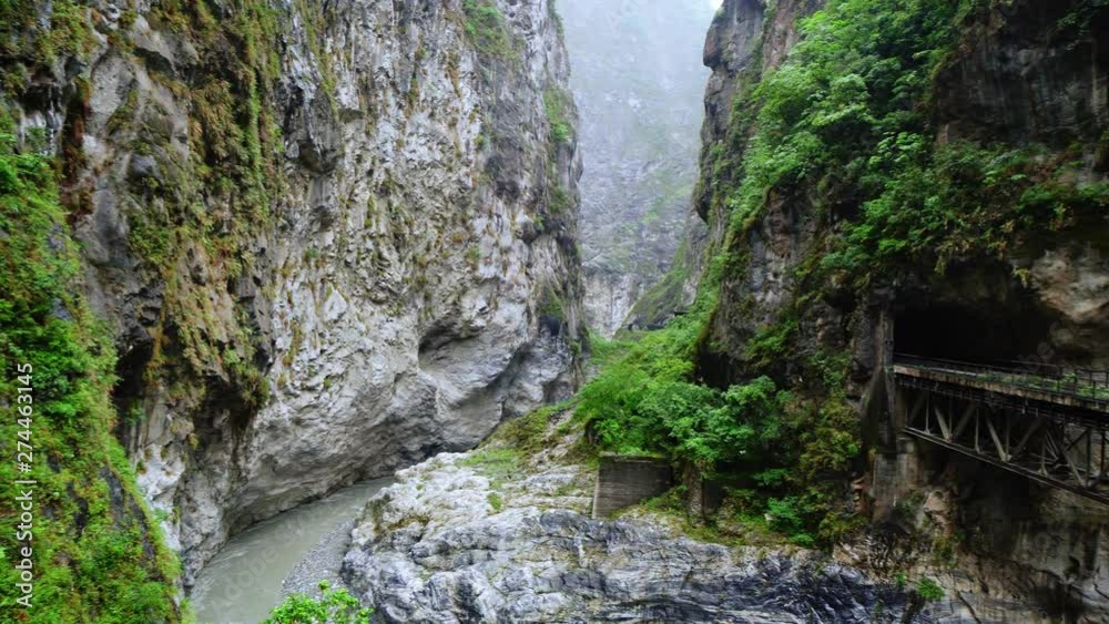 Taroko Gorge National Park in Taiwan. Beautiful Rocky Marble Canyon with Dangerous Cliffs and River. View Point near Liufang Bridge Taroko Gorge National Park in Taiwan. Beautiful Rocky Marble Canyon with Dangerous Cliffs and River. View Point near Liufang Bridge