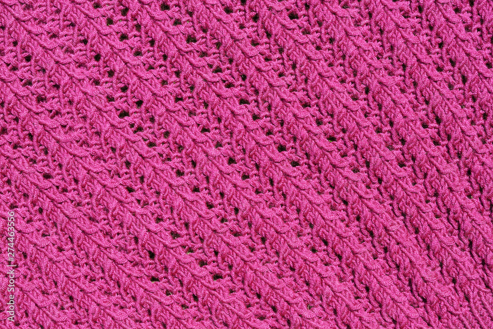 Abstract textured background of close up detail of knitting in a handmade sweater