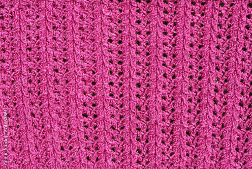 Abstract textured background of close up detail of knitting in a handmade sweater Abstract textured background of close up detail of knitting in a handmade sweater