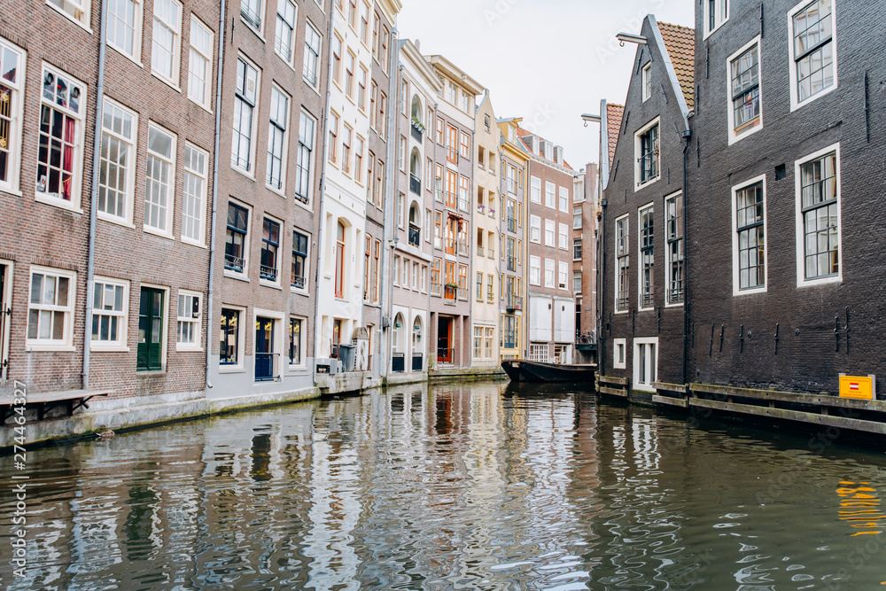 Amsterdam, Netherlands September 5, 2017: Canal in Amsterdam and buildings