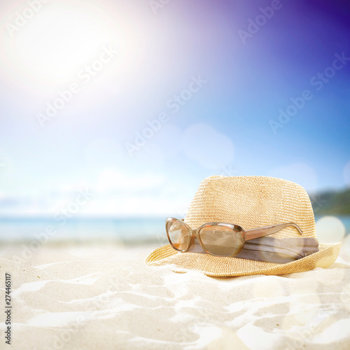 Summer sunglasses on sand and free space for your decoration.  © magdal3na