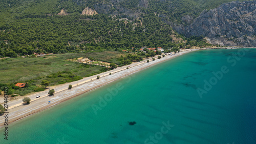 Aerial panoramic photo of famous sandy beach of Psatha in West Attica with emerald clear sea, Corinthian gulf, Greece © aerial-drone