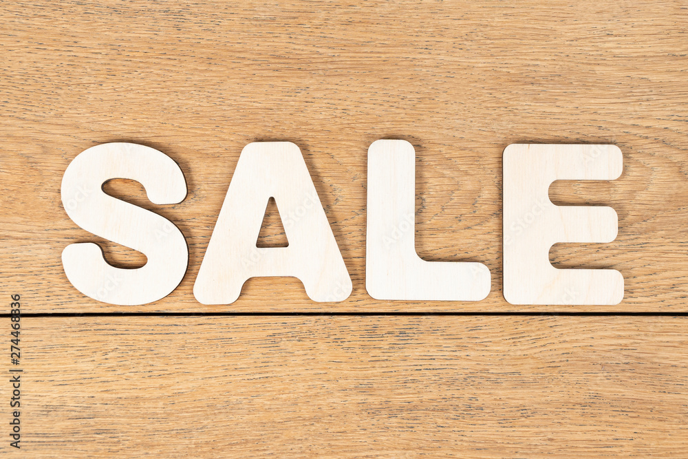 word sale of wooden letters on table word sale of wooden letters on table
