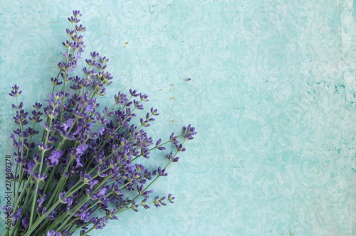 Flowers background. Frame pattern of lavender flowers on pale blue vintage background. top view. copy space