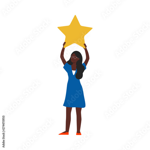 African woman in blue dress holding up a yellow star