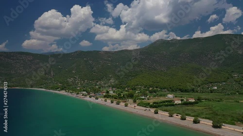 Aerial video of famous sandy beach of Psatha in West Attica with emerald clear sea, Corinthian gulf, Greece photo