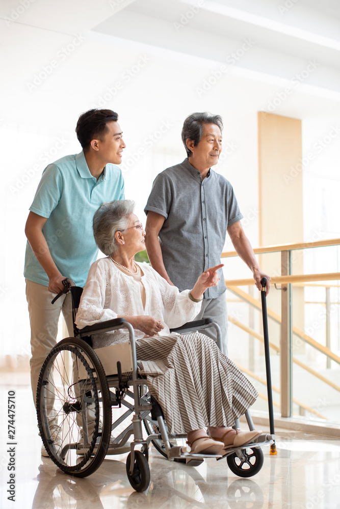 Young nurse assistant taking care of senior people Young nurse assistant taking care of senior people
