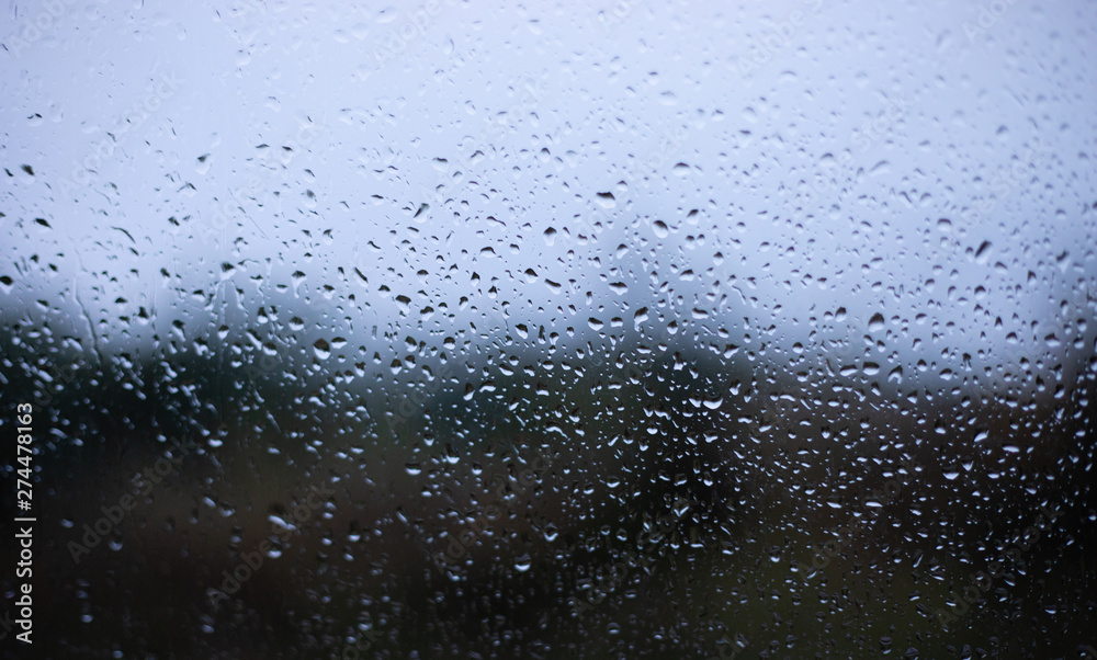 Drops on window blurred background Drops on window blurred background