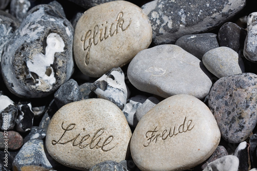 Engraved Stones German Words Joy, Luck, Love