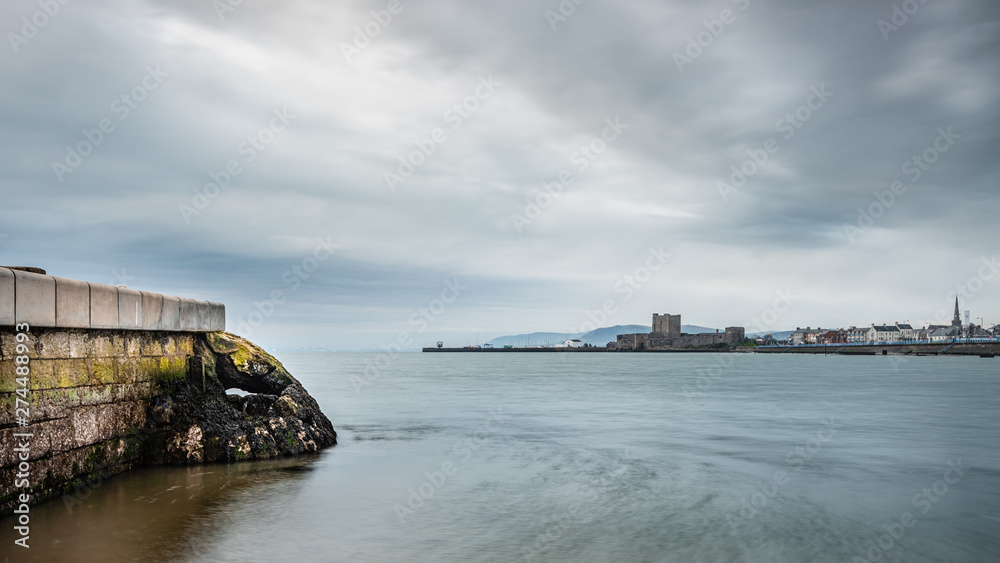 A seascape view of Carrickfergus town from Fisherman's Quay and Downshire Beach.