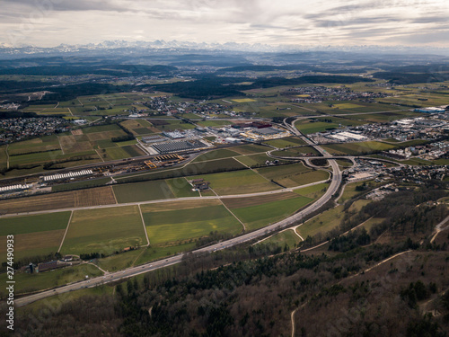 Aerial view urban sprawl Jura mountains in Switzerland