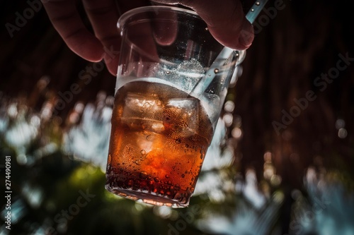 glass of cola with ice