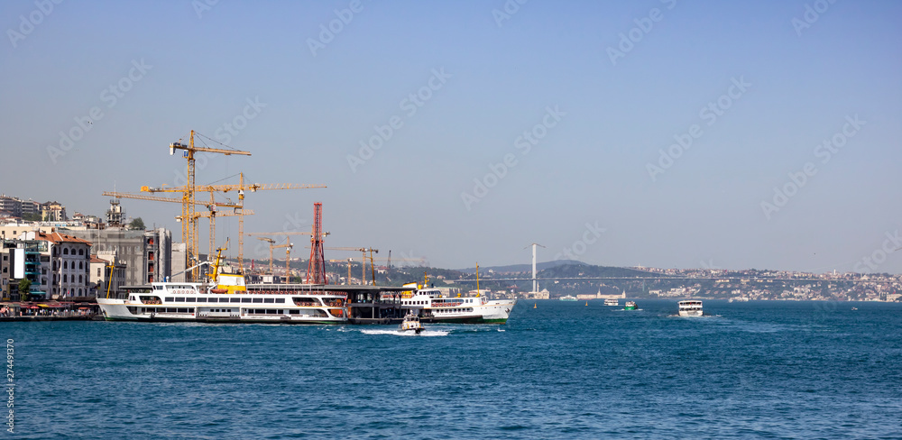 Ferry docked at the pier of Karaköy. Back side of construction work.