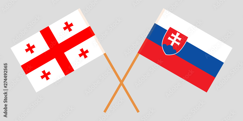 Georgia and Slovakia. Crossed Georgian and Slovakian flags