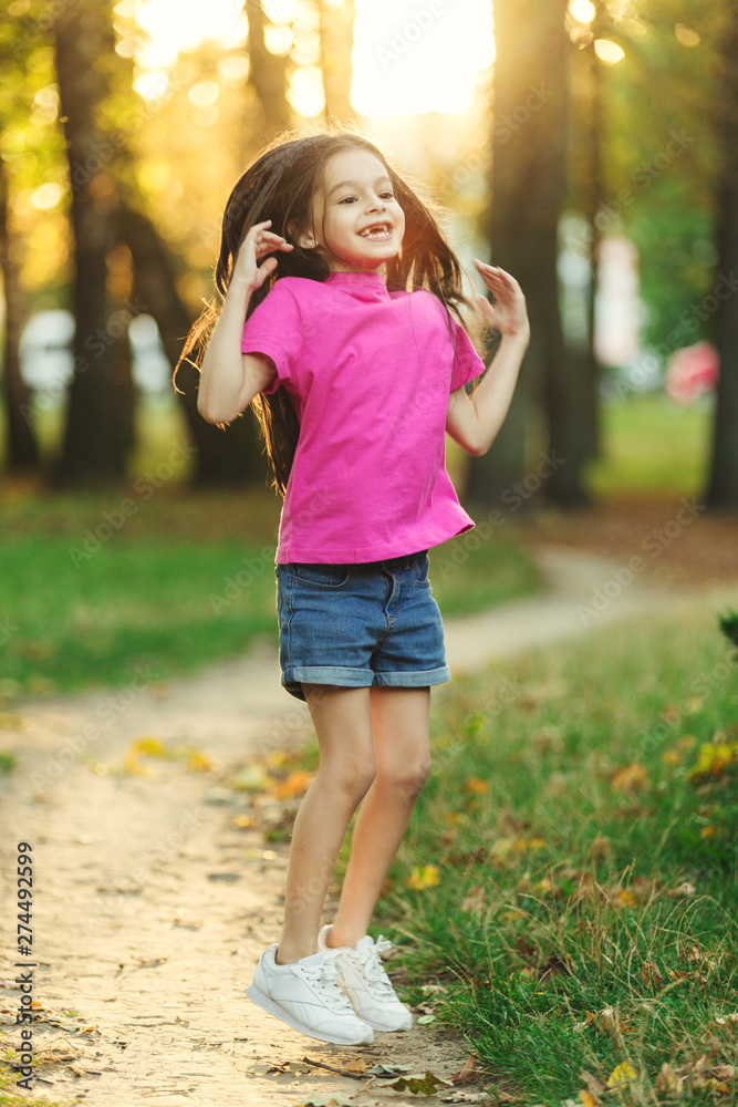 Little cute girl laugh in park Little cute girl laugh in park