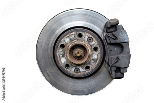 Front brake discs with caliper and brake pads in the car, isolated on a white background with a clipping path.