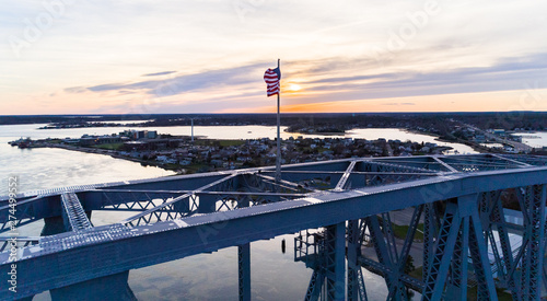 Cape Cod Railroad Bridge Flag Sunset