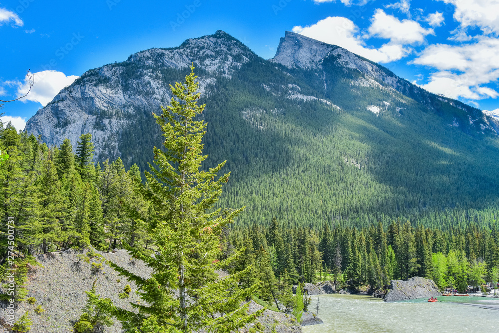 View from Bow Falls Trail Banff National Park Canada. River raft going