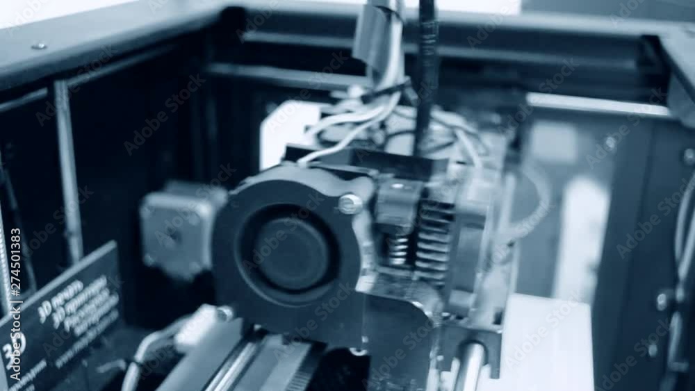 3D printer working. Fused deposition modeling, 3D printer working. Fused deposition modeling,