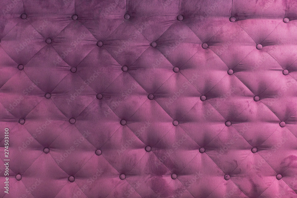 Fototapeta premium Pink coach-type velours screed tightened with buttons. Capitone background