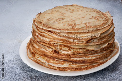 fresh pancakes on a plate white background